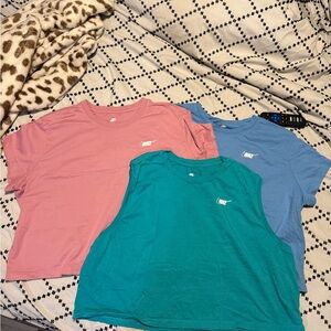 Nike Woman’s Short Sleeve Tee & Tank Trio in Pink, Teal, Blue
